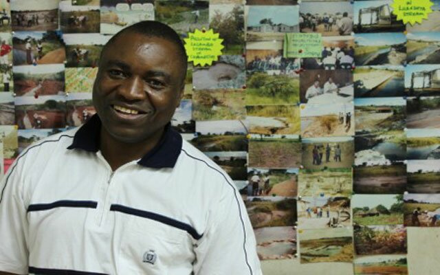 Playboy Millionaire Turned Environmental Activist Kitwe, a dusty industrial city in a region of North West Zambia known as ‘The Copper Belt’, isn’t much to look at. At the end of a burnt out corridor in a half empty office block, Peter Sinkamba’s office is in keeping with its charmless surroundings. If someone told you there was an internationally-acclaimed NGO working inside, you’d laugh out loud. But this set-up epitomised our experience of Peter – as one unlikely scenario unfolded, another would follow.